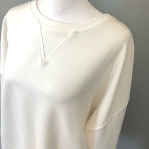 Cynthia Rowley long sleeved women’s cream pullover top.